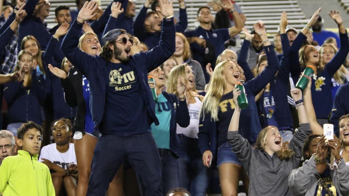 FIU student-athletes from other sports and fans celebrate after quarterback Alex McGough scores the go-ahead touchdown in a 17-10 vicotry over Alcorn State at Legion Field in Birmingham, Ala. on Friday, Sept. 8, 2017.