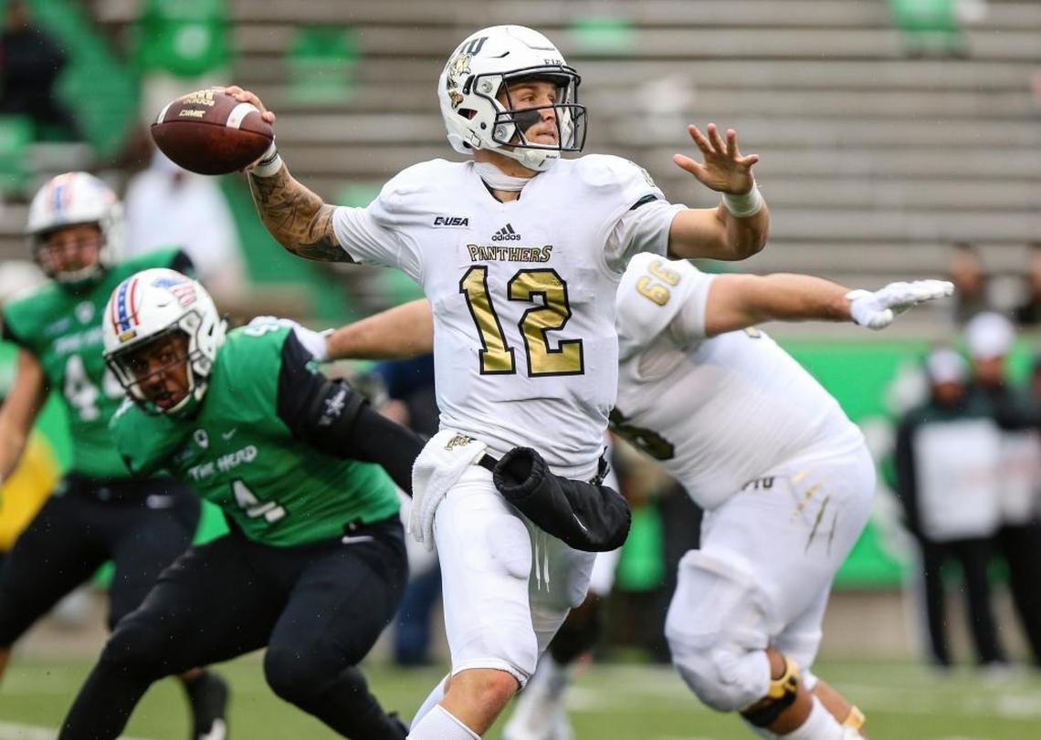 FIU quarterback Alex McGough (12) makes a throw against Marshall during an NCAA college football game, Saturday, Oct. 28, 2017, at Joan C. Edwards Stadium in Huntington, W.Va.