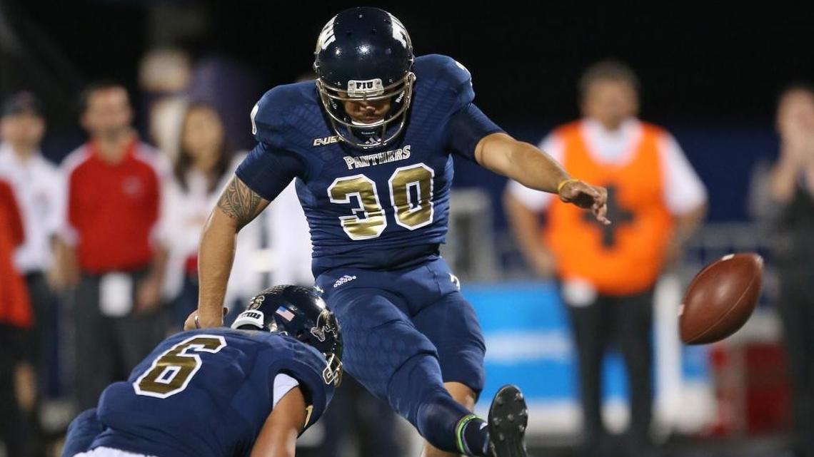 Stone Wilson (6) holds as Jose Borregales #30 of the Florida International Golden Panthers kicks the point after a touchdown against the Western Kentucky Hilltoppers on Nov. 24, 2017, at Riccardo Silva Stadium in Miami. They orchestrated a fake field goal that led to a touchdown.