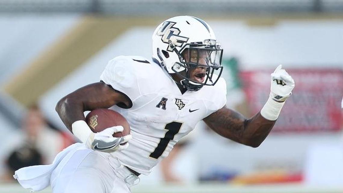 Central Florida running back Jawon Hamilton (1) runs during an NCAA college football game against South Carolina State, Sat., Sept. 3, 2016 in Orlando, Fla.