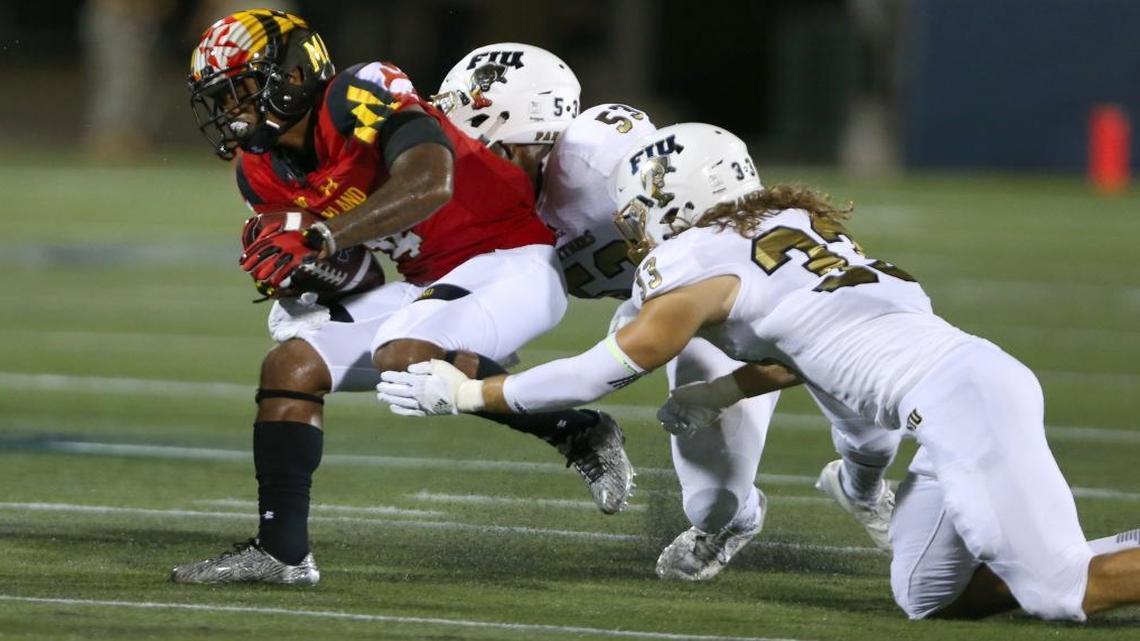 Maryland Terrapins defensive back William Likely runs the ball against FIU Panthers linebacker Anthony Wint (53) and FIU Panthers safety Niko Gonzalez in the first quarter of an NCAA college football game, Fri., Sept. 9, 2016, in Miami.