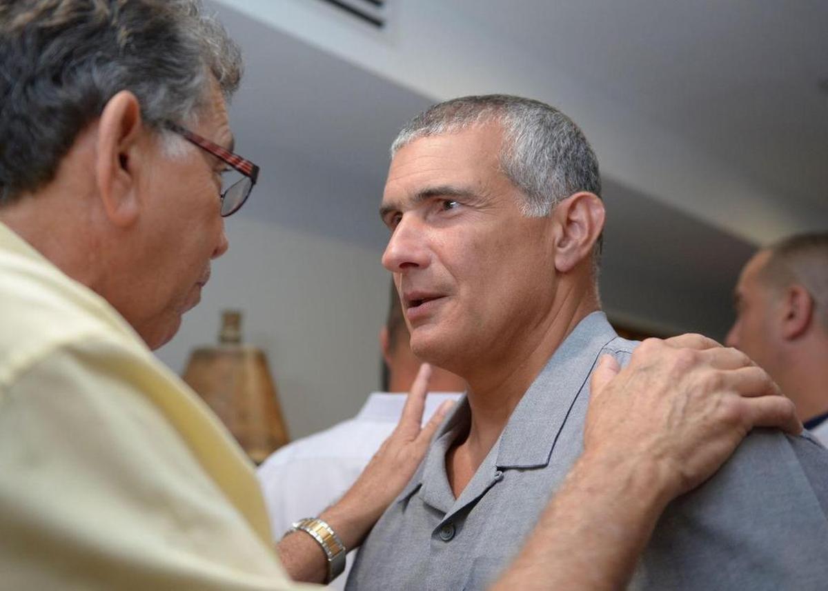 Rafael “Tuna” Oliva, left, congratulates Frank Martin on his NCAA Final Four run.