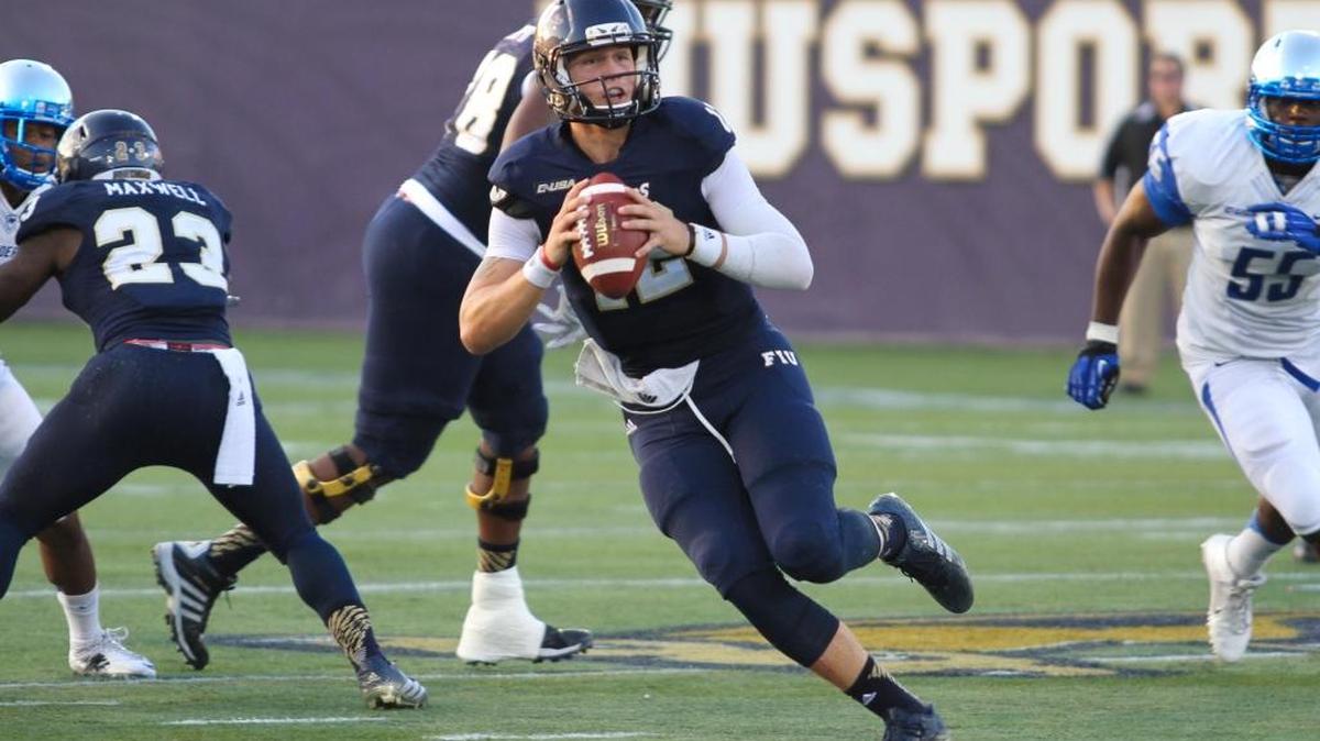 
FIU quarterback Alex McGough prepares to throw a pass against Middle Tennessee State last season. 
