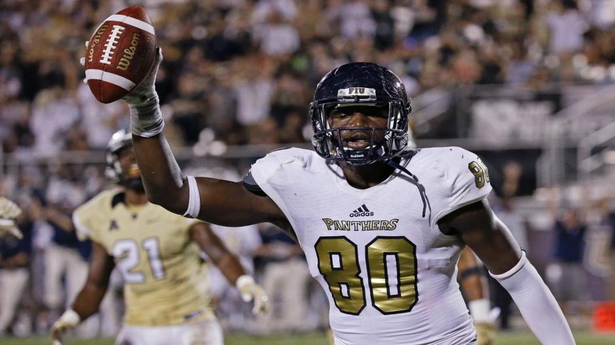 FIU tight end Ya'Keem Griner celebrates a touchdown catch against Central Florida on Thursday, Sept. 3, 2015, in Orlando, Fla.