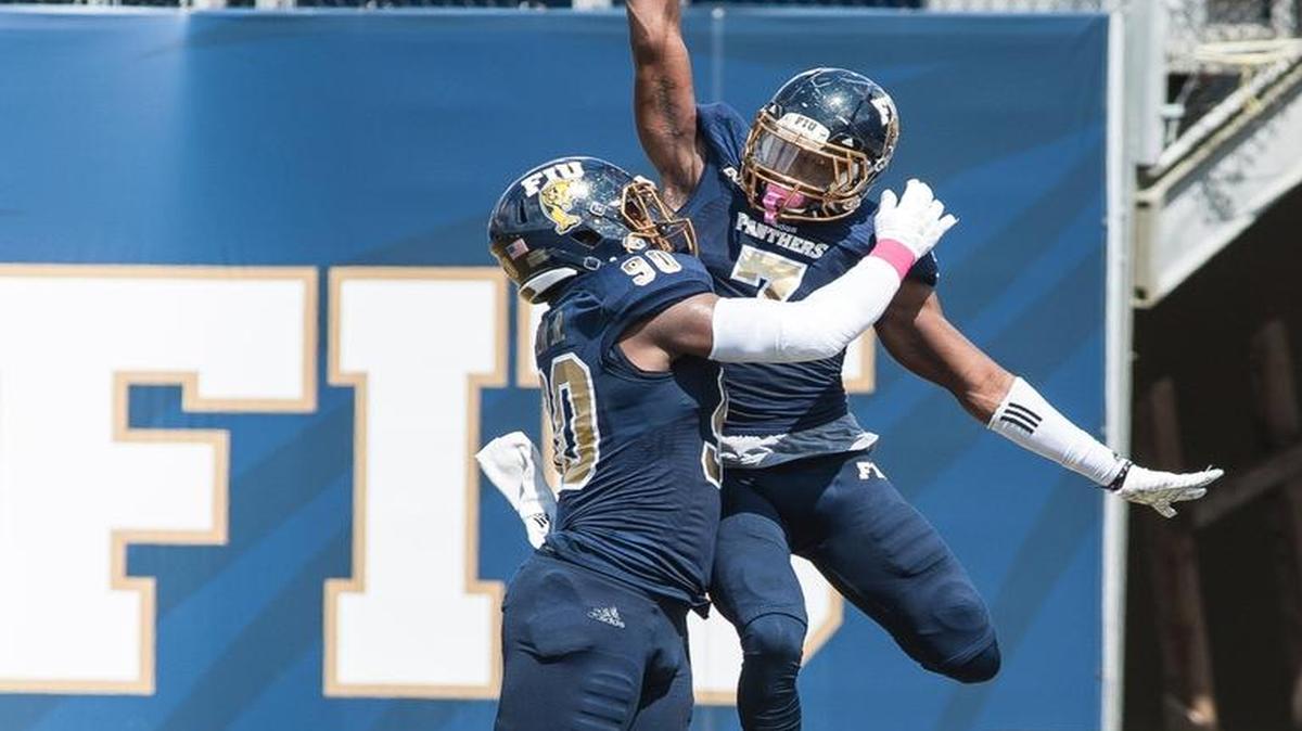 
FIU’s Fermin Silva (90) and Jeremiah McKinnon (7) celebrate a touchdown in the endzone in the second quarter as the FIU Panthers take on UTEP in a college football game at Florida International University on Saturday, Oct. 10, 2015 in Miami. FIU beat UTEP 52-12.
