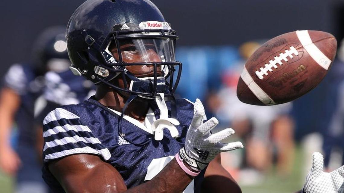 
Fifth-year senior cornerback Richard Leonard catches a pass during the first day of FIU football practice at FIU Stadium on Wednesday, Aug. 5, 2015.
