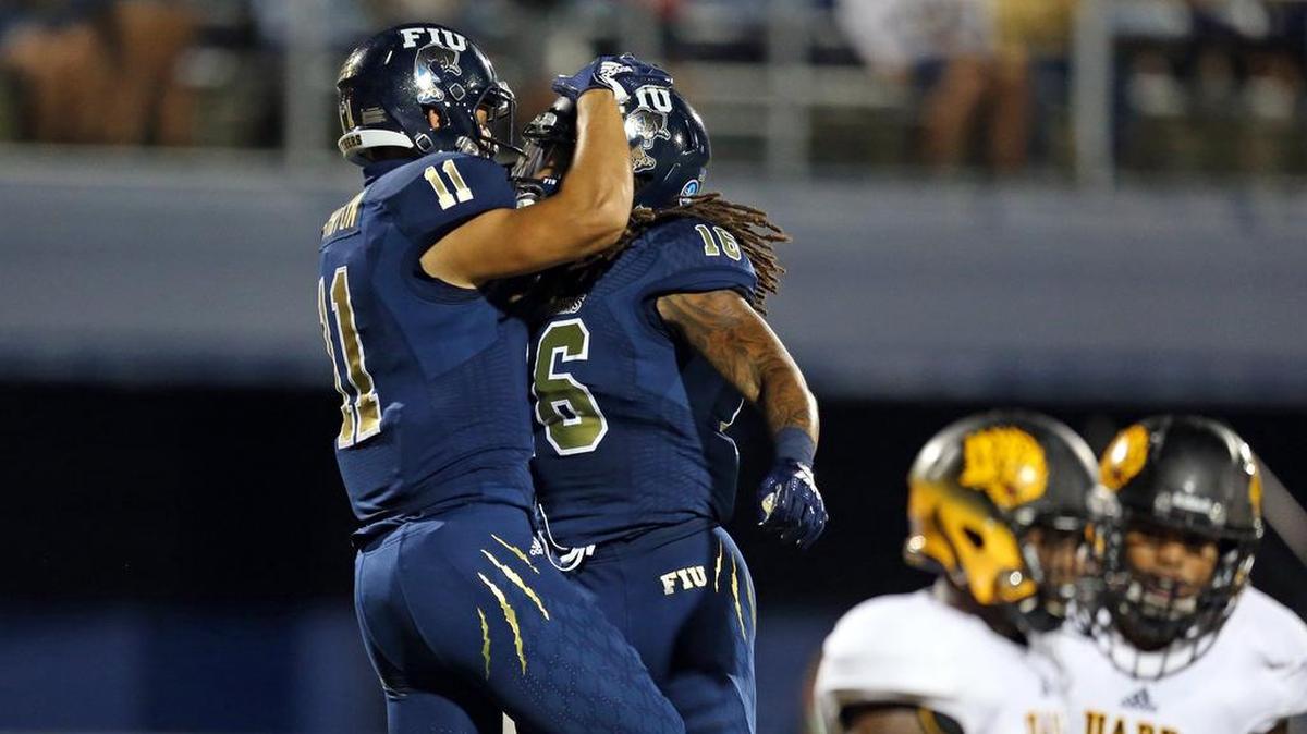 FIU Panthers wide receiver CJ Worton (11) and FIU Panthers wide receiver Tony Gaiter IV (16) celebrate Worton’s touchdown in the first half as FIU Panthers host Arkansas Pine-Bluff at Ricardo Silva Stadium in Miami on Saturday, Sept. 29, 2018. FIU improved its record to 3-2 with a 55-9 victory.