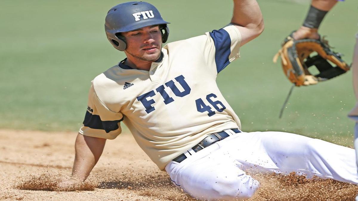 
FIU outfielder Brian Portelli (46) advances to home plate in the eighth inning as Florida International University Panthers hosts the East Carolina Pirates at Mark Light Field at Alex Rodriguez Park at Mark Light Field in Coral Gables on May 30, 2015.
