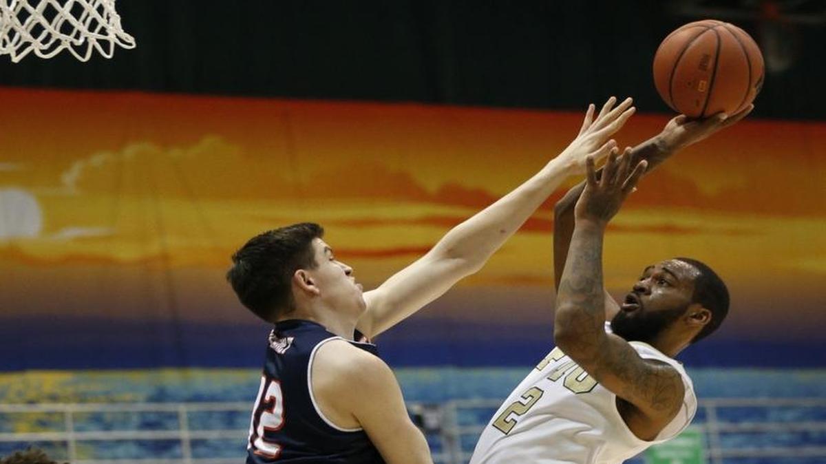 Guard Donte McGill, right, was the leading scorer for the Panthers last season.