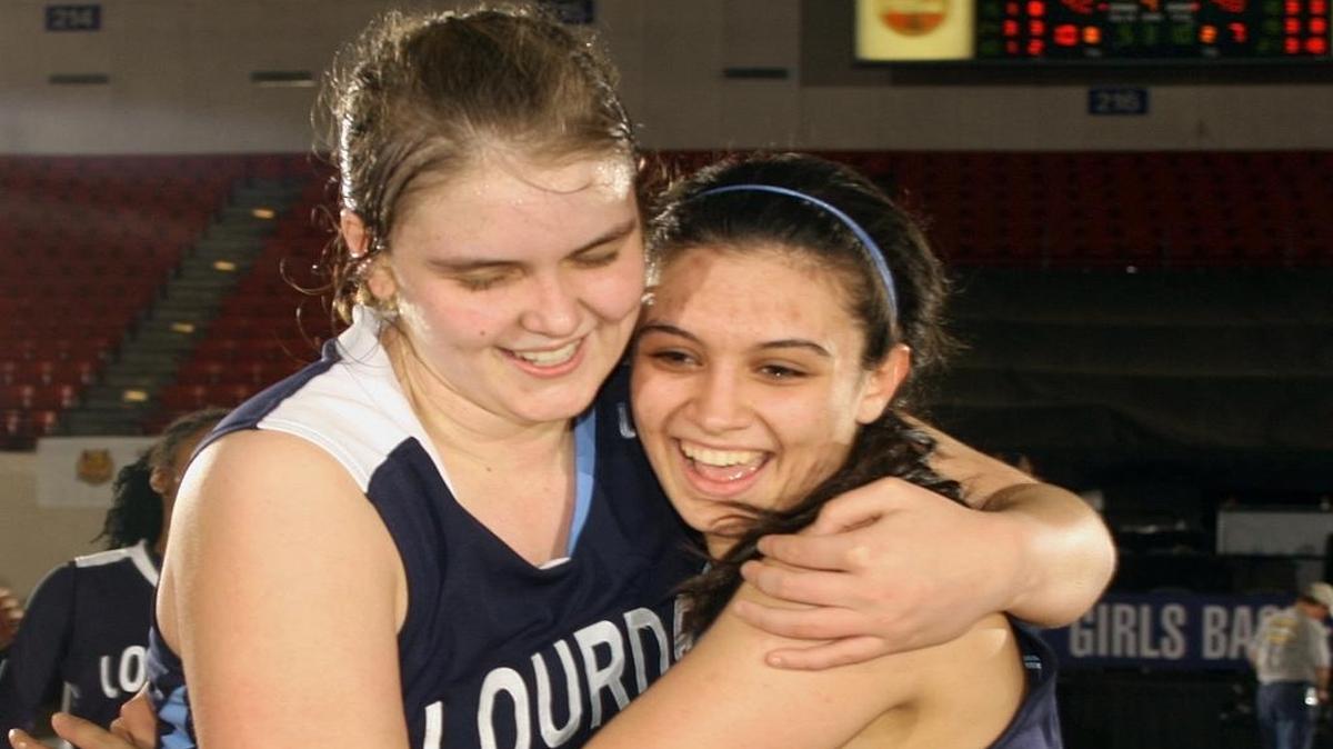 Jackie Perez, right, helped Lourdes Academy post post an 87-10 record in her final three years.