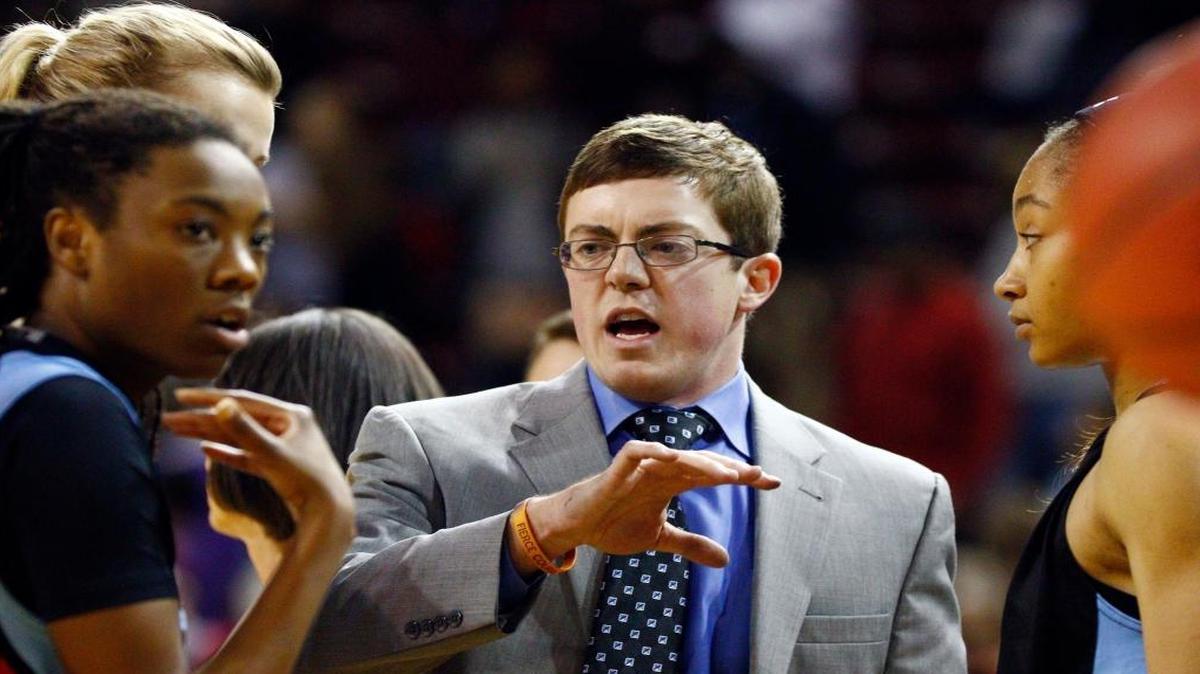 In this Dec. 11, 2014 file photo, Louisiana Tech women’s basketball coach Tyler Summitt, center, talks strategy with his players during a time out in an NCAA college basketball game against Mississippi State in Starkville, Miss. Tyler Summitt has resigned as Louisiana Tech women’s basketball coach and acknowledged having an inappropriate relationship, Thursday, April 7, 2016.