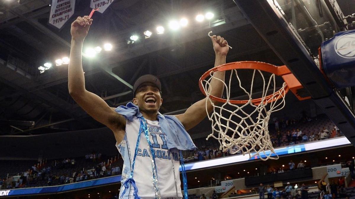 EAST REGION: Brice Johnson helps cut down the nets after leading North Carolina to the ACC tournament title.