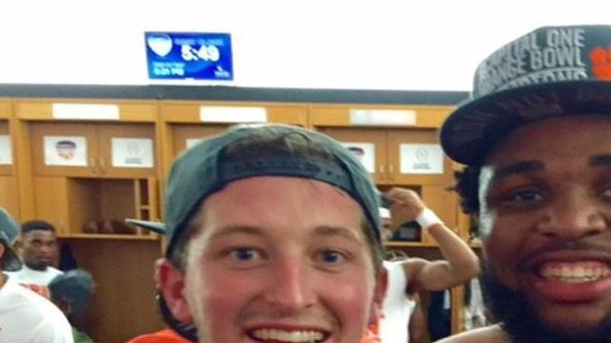Clemson punter Andy Teasdall, left, and Christian Wilkins hooked up on a 31-yard completion on a fake punt.