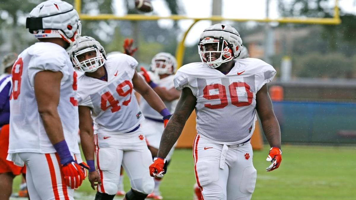 Clemson Tigers defensive end Shaq Lawson chats with teammates during practice at Nova Southeastern University on Sunday, December 27, 2015