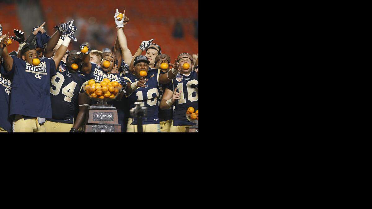 
Georgia Tech players celebrate after defeating Mississippi State at the 2014 Orange Bowl Game at Sun Life Stadium on Wednesday, Dec. 31, 2014.
