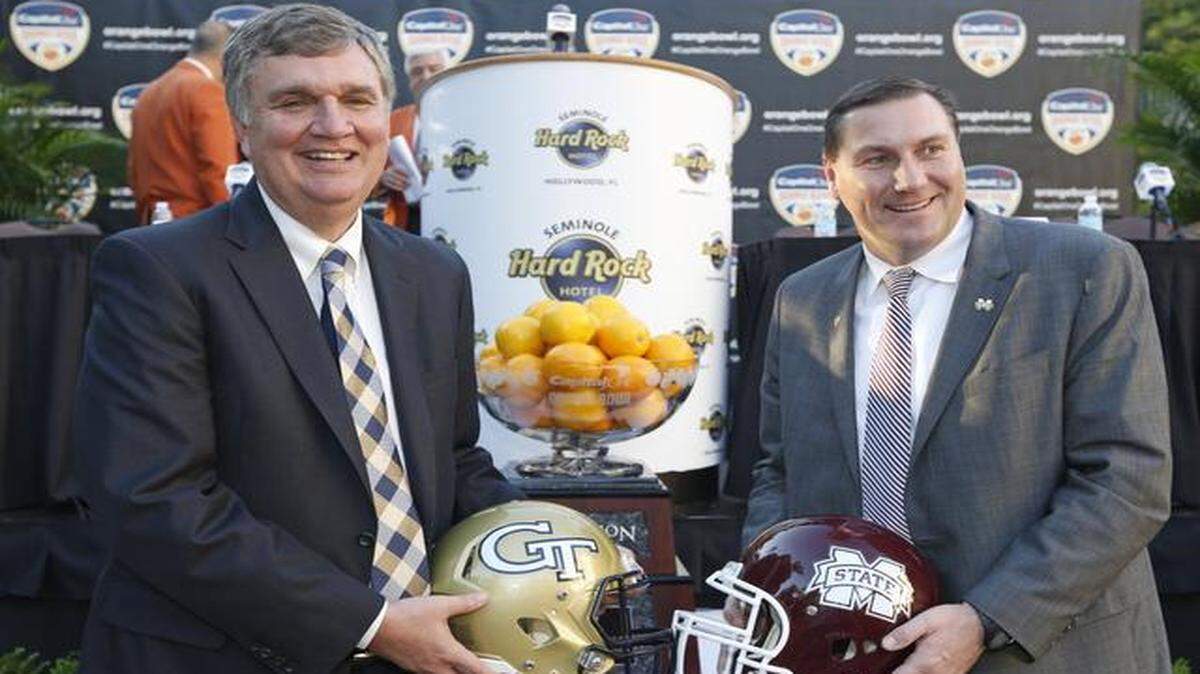 
The coaches of the Capital One Orange Bowl, Georgia Tech's Paul Johnson, left, and Mississippi State's Dan Mullen at a press conference at the Seminole Hard Rock in Hollywood on Wednesday, December 10, 2014.
