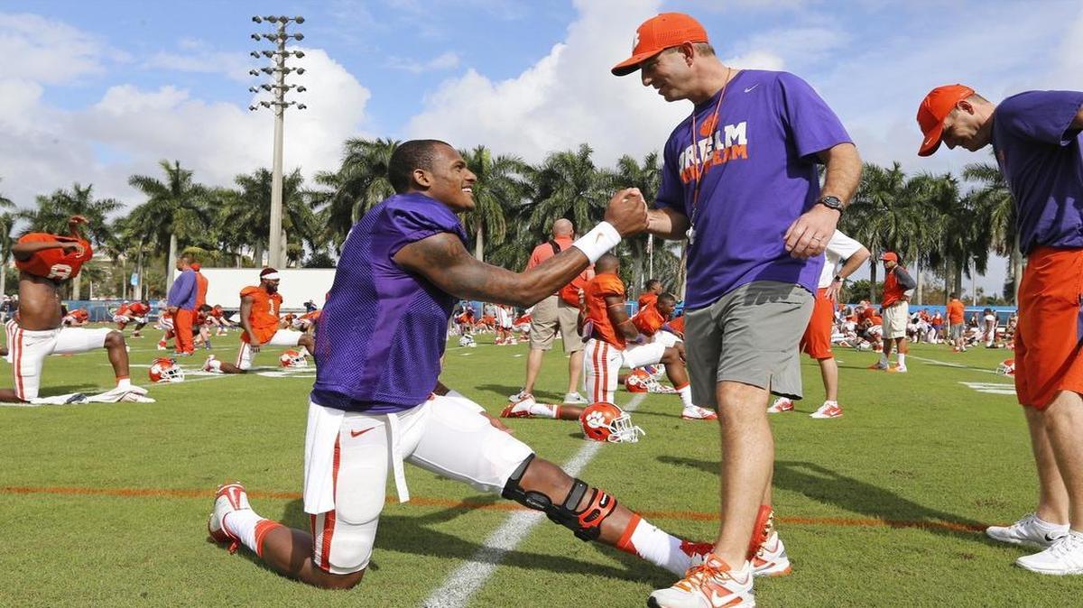 Clemson coach Dabo Swinney talks with quarterback Deshaun Watson during practice at Nova Southeastern. Watson, a Heisman Trophy finalist, is one of the most dynamic players in the country and leads Clemson against Oklahoma in a College Football Playoff semifinal on Thursday.