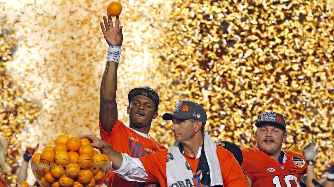 Deshaun Watson (left) celebrates Clemson’s 2015 College Football Playoff win in the Orange Bowl game. Four seasons later he’s leading the Houston Texans -- and just won Week 5 in the Miami Herald NFL quarterback rankings.