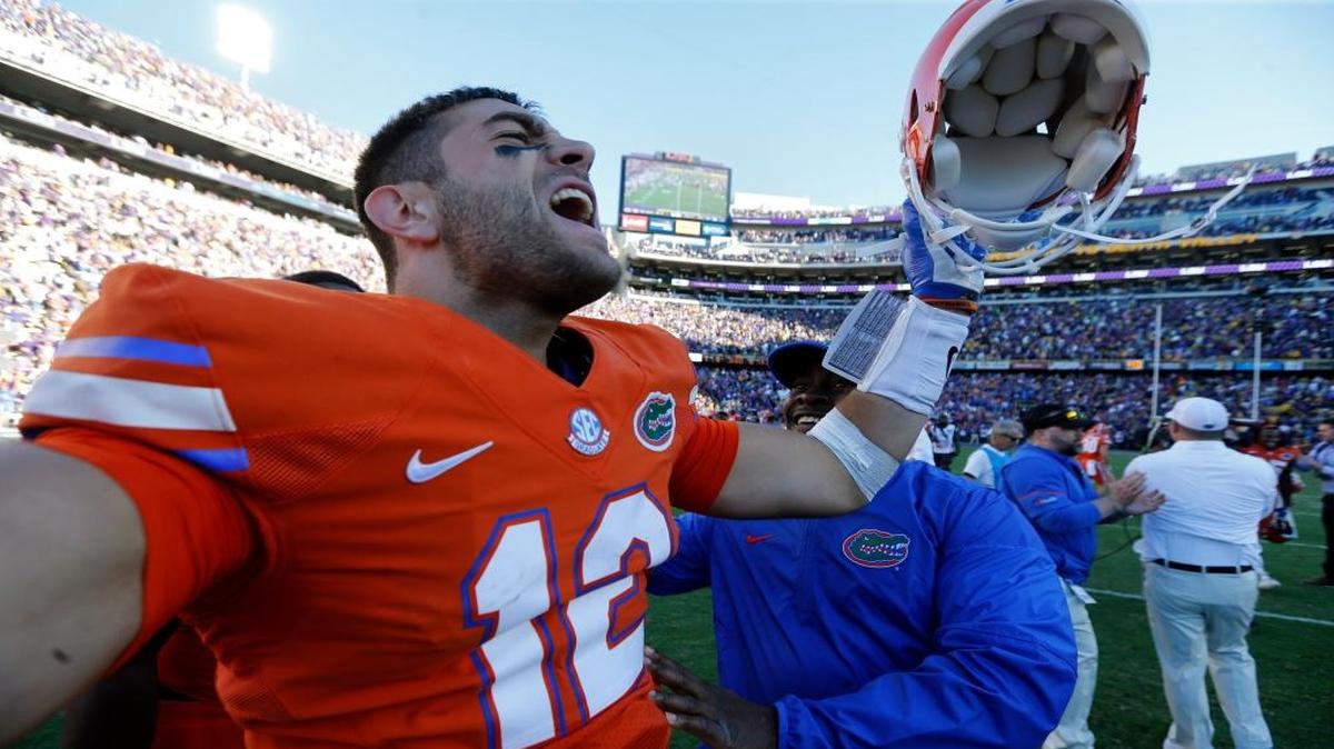 Florida quarterback Austin Appleby (12) celebrates after defeating LSU in an NCAA college football game in Baton Rouge, La., Saturday, Nov. 19, 2016. Florida won 16-10.