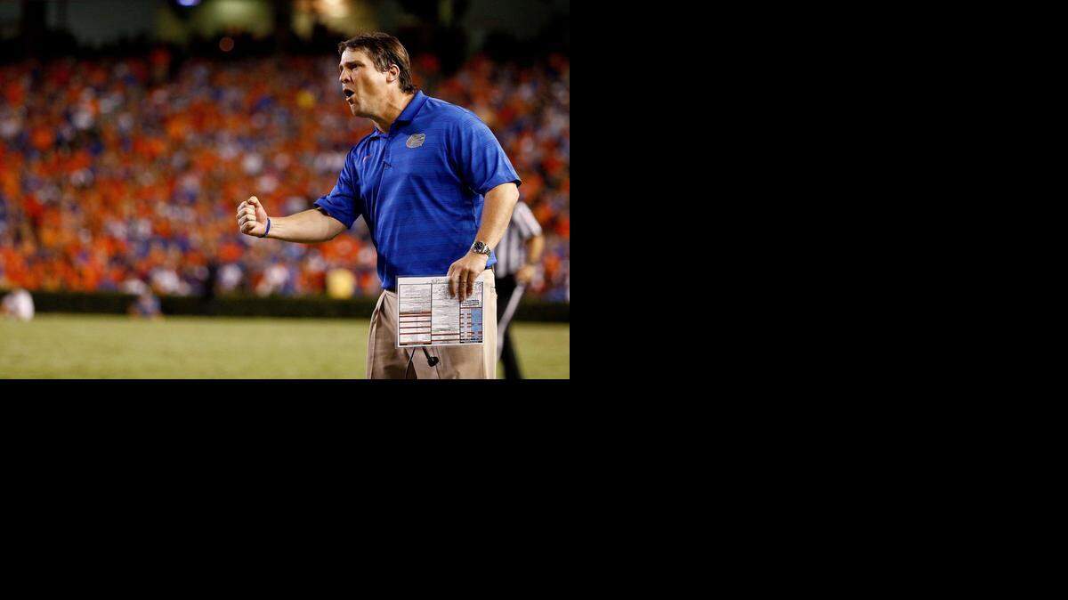 
Head coach Will Muschamp of the Florida Gators yells during the second half of the game against the Kentucky Wildcats at Ben Hill Griffin Stadium on September 13, 2014 in Gainesville, Florida. 
