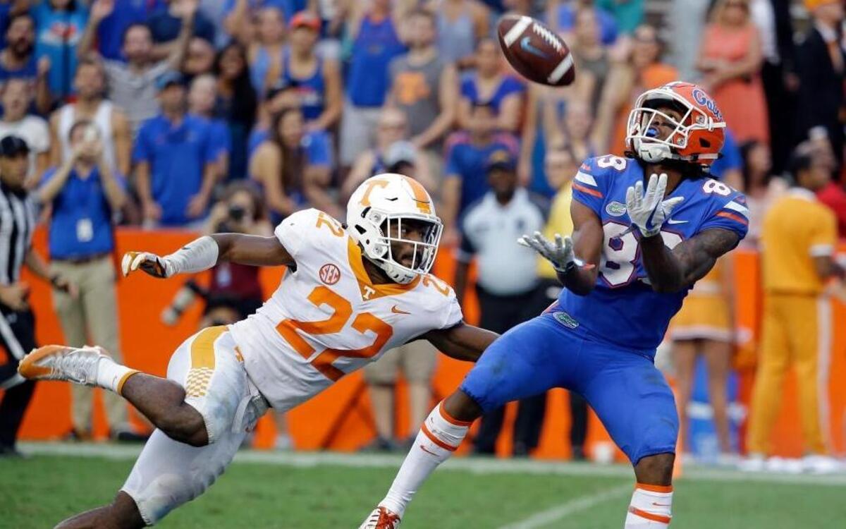 Florida wide receiver Tyrie Cleveland, right, catches the game winning 63-yard touchdown pass in front of Tennessee defensive back Micah Abernathy (22) as time expired in the fourth quarter of an NCAA college football game in Gainesville, Fla. Florida won 26-20. One year after injuries and big plays made it tough for Tennessee to stop anyone late in the season, the Volunteers find themselves again dealing with those same issues. The stunning finish to the loss to Florida wounded the pride of a defense that already had taken plenty of lumps this season.