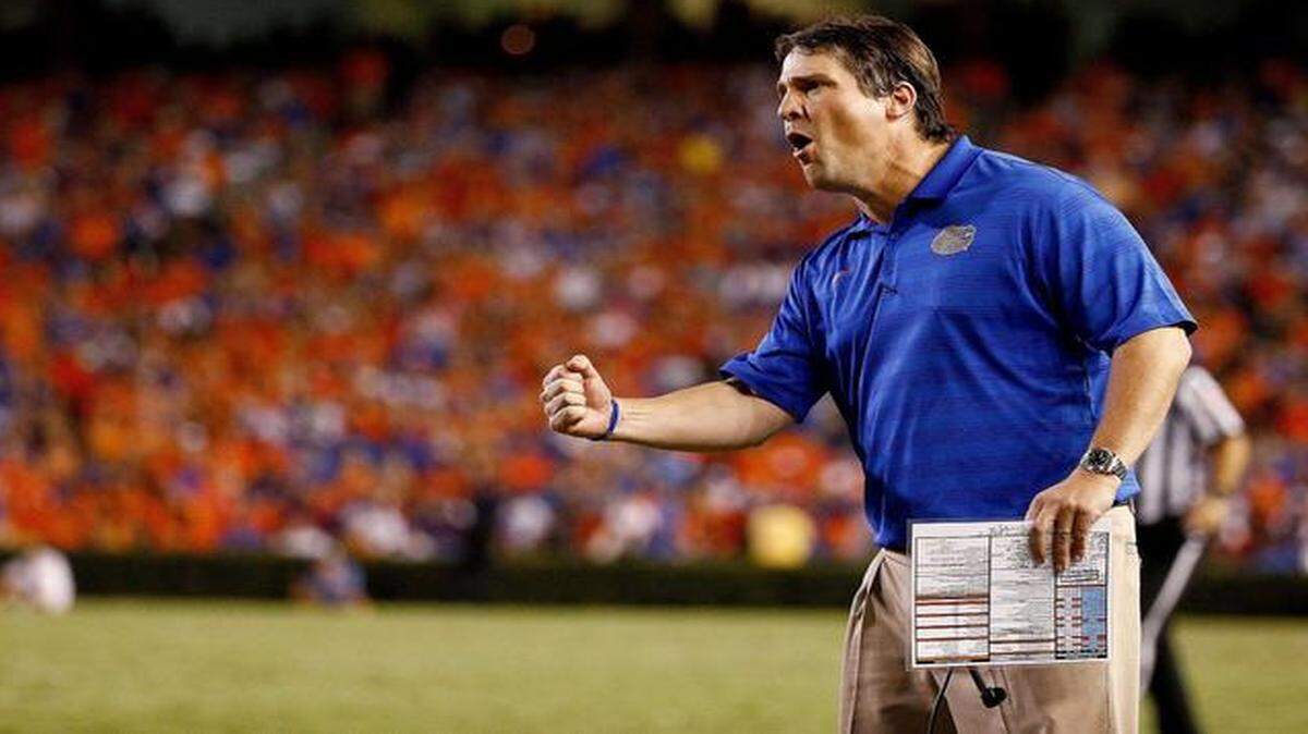 
Head coach Will Muschamp of the Florida Gators yells during the second half of the game against the Kentucky Wildcats at Ben Hill Griffin Stadium on September 13, 2014 in Gainesville, Florida.
