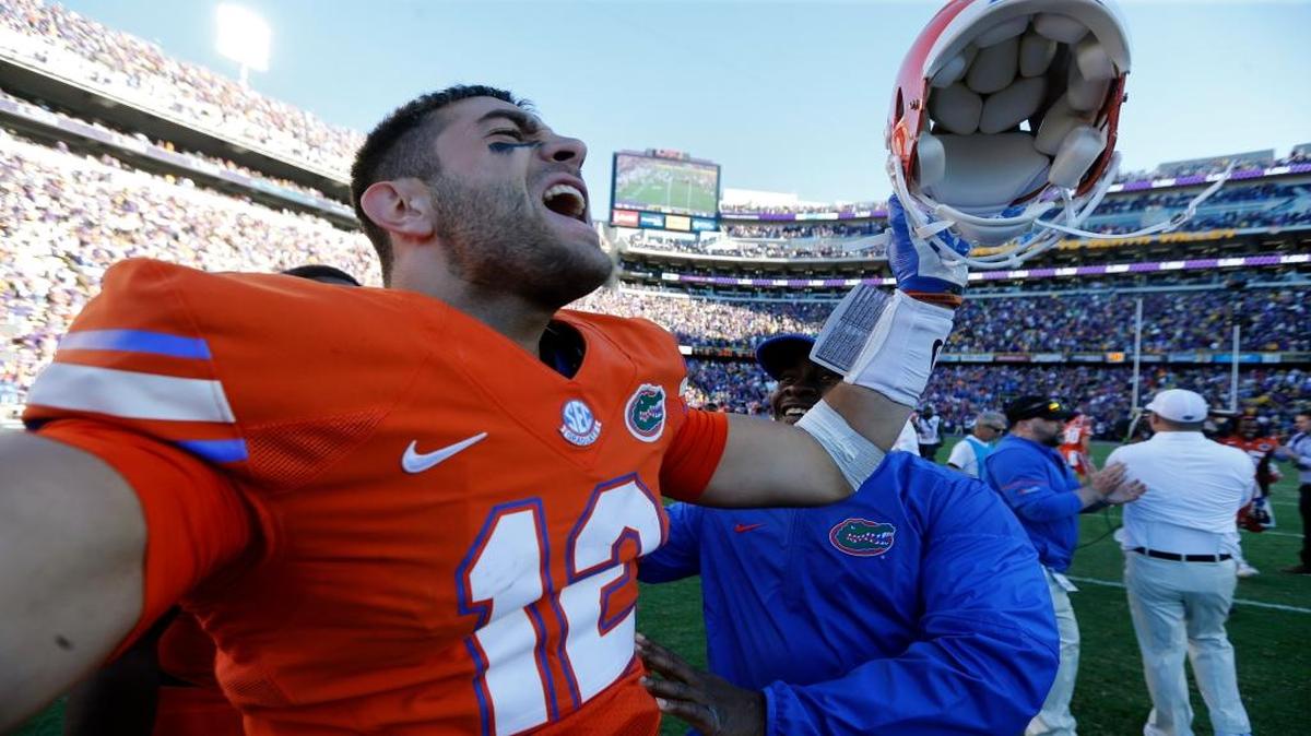 Florida quarterback Austin Appleby (12) celebrates after defeating LSU in an an NCAA college football game in Baton Rouge, La., Saturday, Nov. 19, 2016. Florida won 16-10.