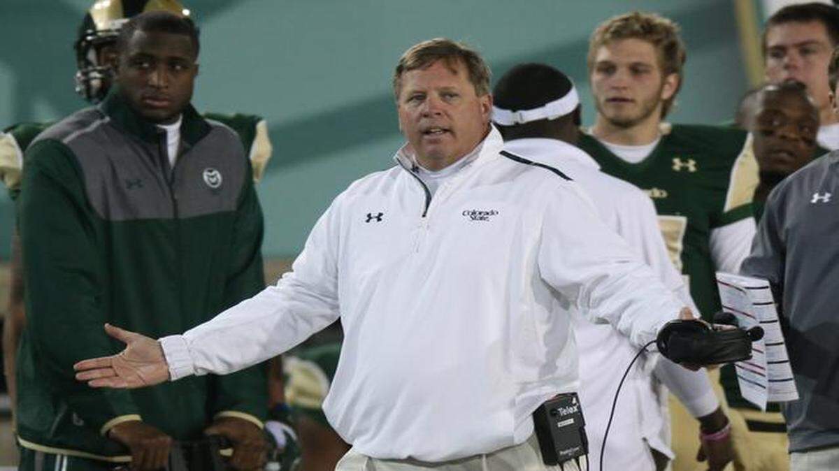 
Colorado State head coach JIm McElwain argues call while facing Hawaii in the first quarter of an NCAA college football game in Fort Collins, Colo., on Saturday, Nov. 8, 2014. 
