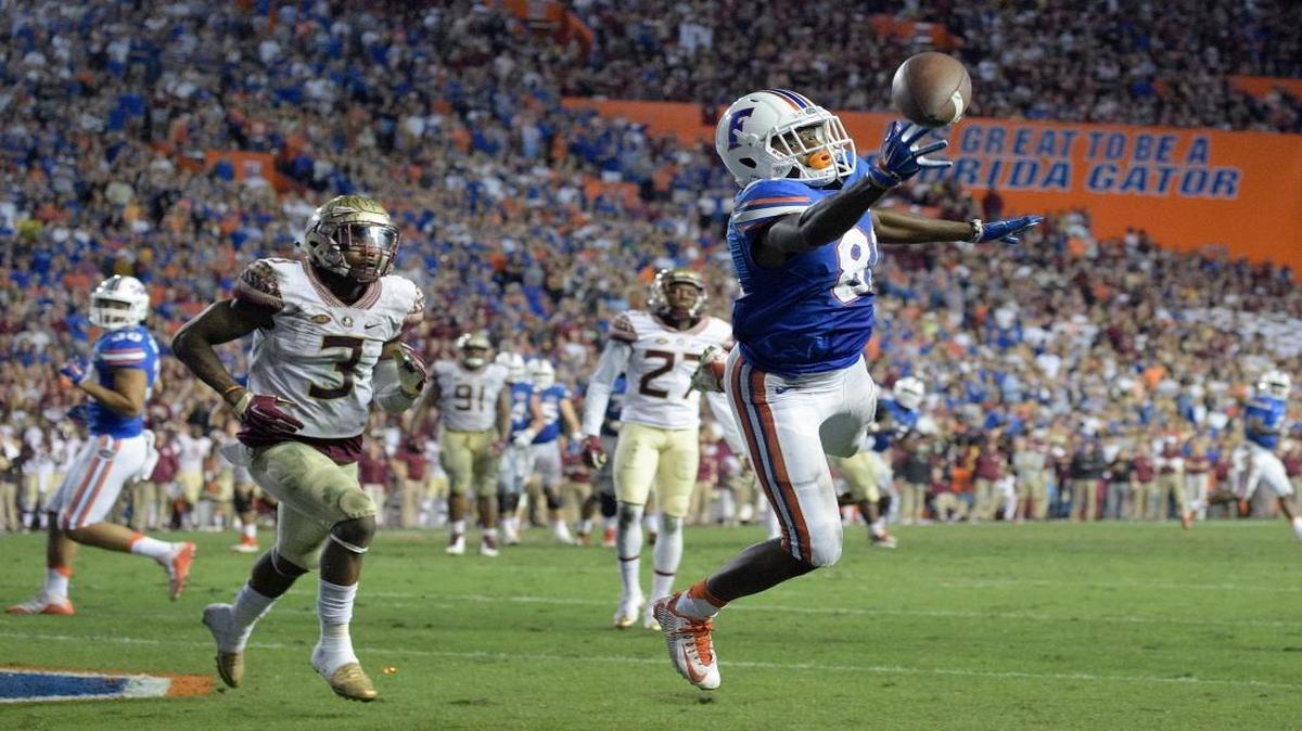 Florida wide receiver Antonio Callaway (81) misses a pass in the end zone in front of Florida State defensive back Derwin James (3) during the second half of an NCAA college football game in Gainesville, Fla., Saturday, Nov. 28, 2015. Florida State won 27-2.