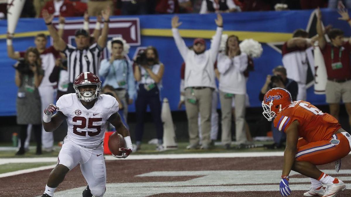 Alabama running back Joshua Jacobs (25) celebrates his touchdown against Florida during the first half of the Southeastern Conference championship NCAA college football game on Dec. 3, 2016, in Atlanta.