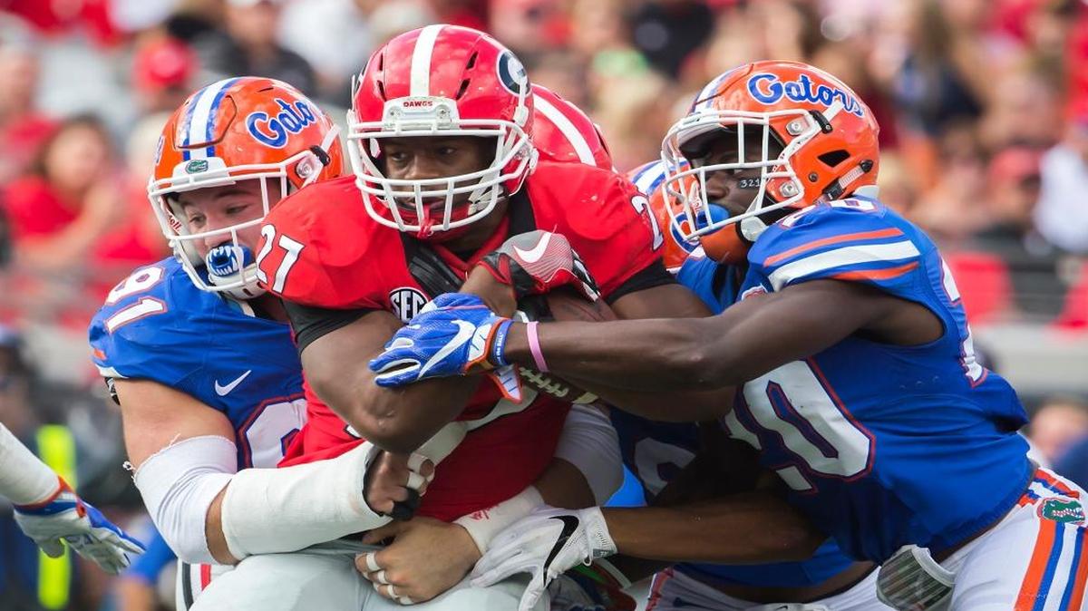 Joey Ivie (91) still remembers the in-house visit. Will Muschamp, then the head coach of the Florida Gators, and a pair of assistant coaches sat at Ivie’s dinner table, at Chinese food and explained to the high school defensive lineman from the Tampa area why he should come to UF.