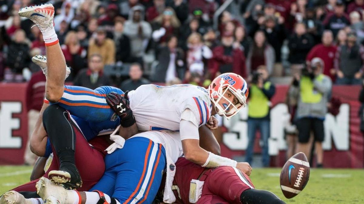 Florida quarterback Feleipe Franks (13) watches a batted pass attempt against South Carolina during the second half of an NCAA college football game Saturday, Nov. 11, 2017, in Columbia, S.C. South Carolina defeated Florida 28-20.