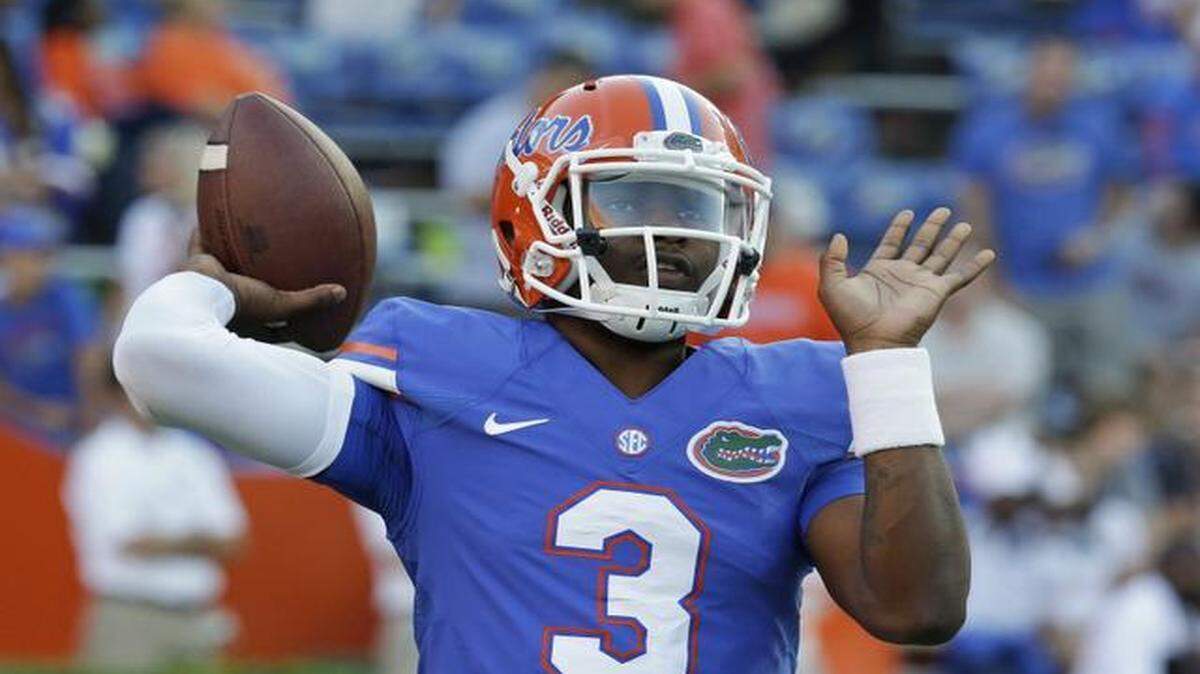 
Florida quarterback Treon Harris (3) warms up prior to an NCAA college football game against Missouri in Gainesville on Oct. 18, 2014.
