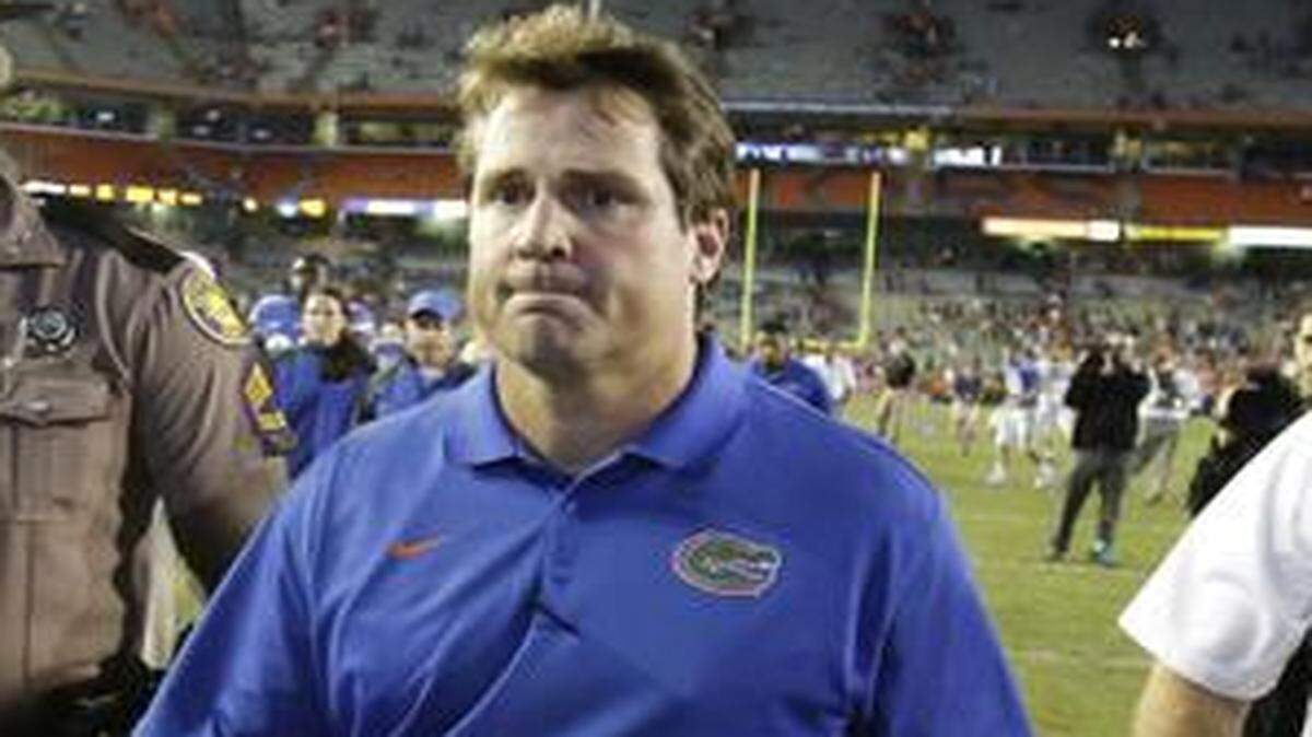 
UF coach Will Muschamp leaves the field after a 42-13 home loss to Missouri on Saturday, Oct. 18, 2014. 
