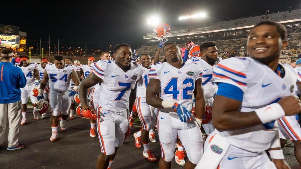 
The Florida team celebrates with its fans after defeated Missouri 21-3 in an NCAA college football game, Saturday, Oct. 10 2015, in Columbia, Mo. 
