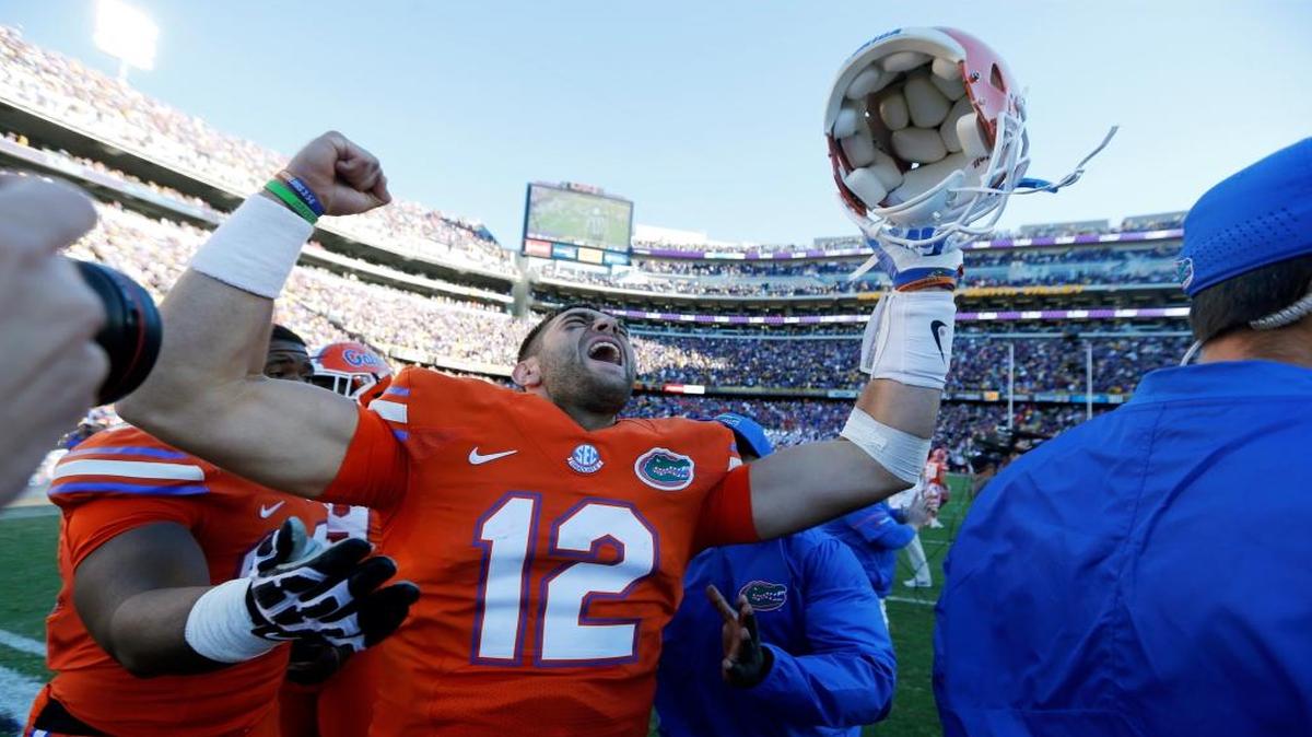 Florida quarterback Austin Appleby (12) celebrates after defeating LSU in an an NCAA college football game in Baton Rouge, La., Sat., Nov. 19, 2016. Florida won 16-10.