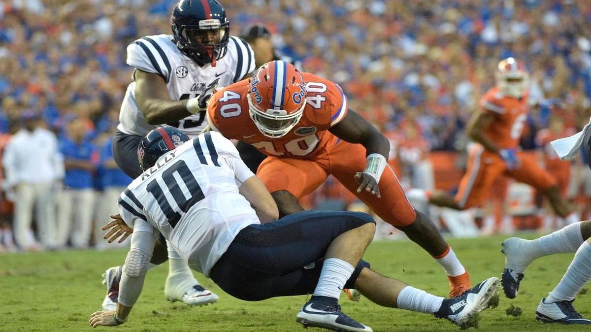 Mississippi quarterback Chad Kelly (10) is sacked by Florida linebacker Jarrad Davis (40) during the first half of an NCAA college football game in Gainesville, Fla. Davis is an athletic outside linebacker who needs to be better working his way through traffic to ball carriers. Strong pro day could push him into the first round.
