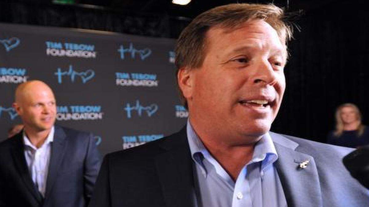 
Florida football coach Jim McElwain speaks as he arrives for the Tim Tebow Foundation Celebrity Gala and Golf Classic, Friday, March 13, 2015, in Ponte Vedra Beach, Fla. 
