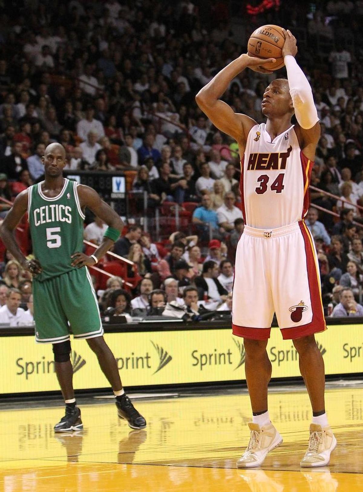 File photo: Ray Allen shoots a free throw as Kevin Garnett looks during the fourth quarter of the 2012-13 NBA season opener game between the Boston Celtics against Miami Heat at the AmericanAirlines Arena in Miami on Tuesday, October 30, 2012.