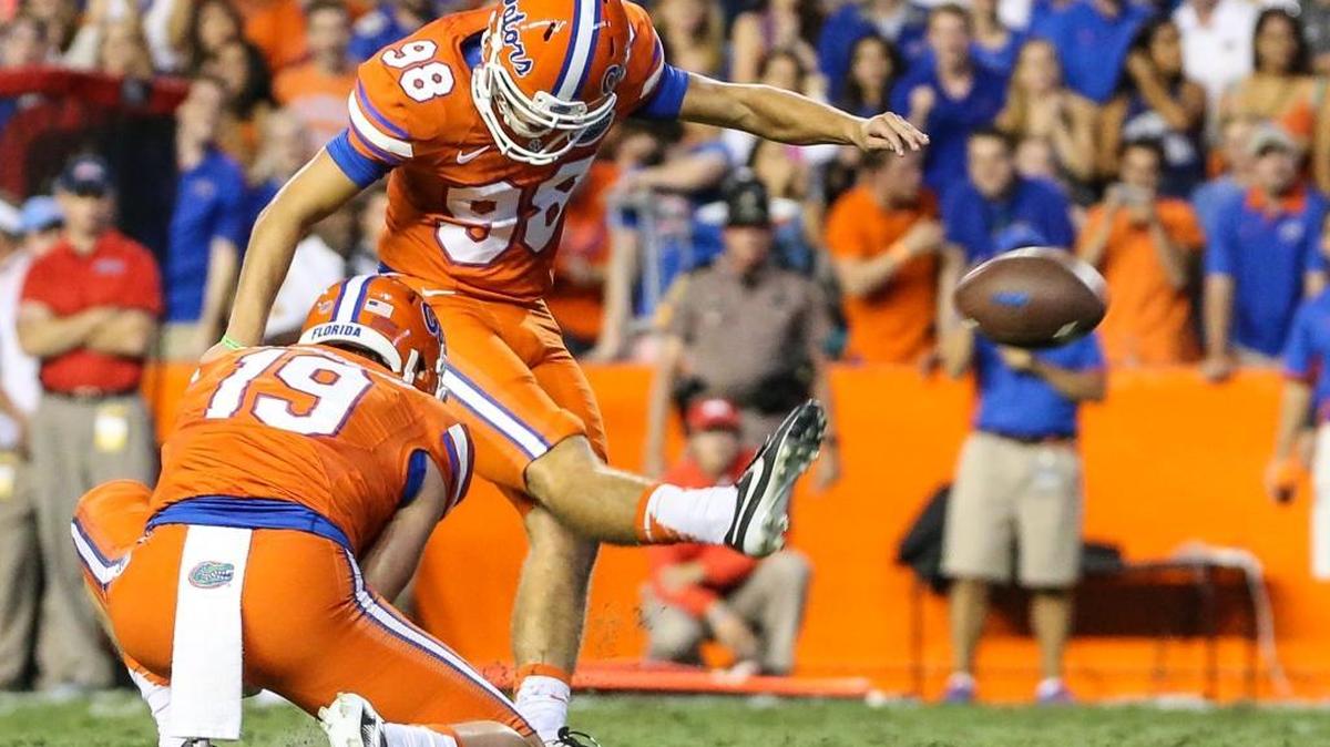
Florida place kicker Jorge Powell (98) kicks the ball into the upright in an unsuccessful point-after-touchdown attempt against Mississippi on Saturday, Oct. 3, 2015, in Gainesville, Fla. 
