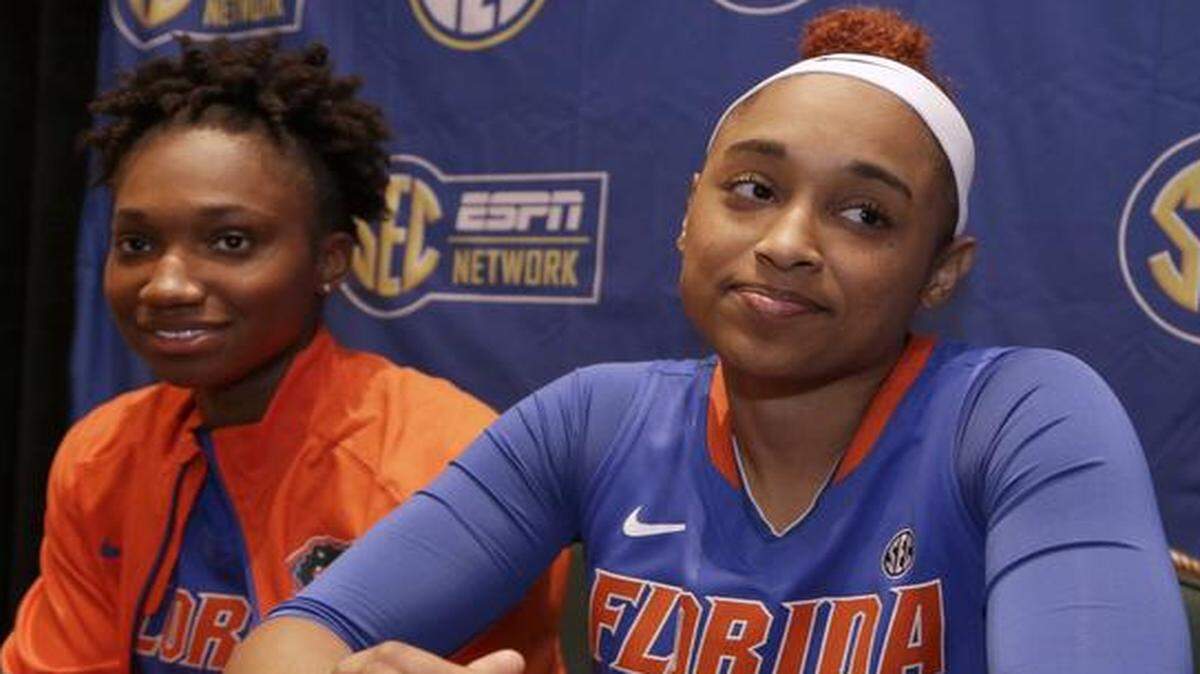 
Florida players Cassie Peoples, right, and Kayla Lewis, left, answer a question during a news conference at the SEC women’s basketball media day in Charlotte, N.C., Tuesday, Oct. 21, 2014.
