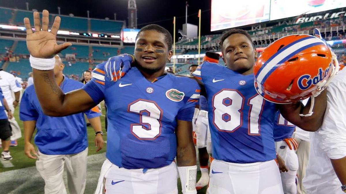 Florida quarterback Treon Harris (3) and wide receiver Antonio Callaway (81) walk off the field after a victory against Georgia in Jacksonville, Fla, on Oct. 31, 2015. Florida coach Jim McElwain said Tuesday, March 8, 2016, that Harris and Callaway are suspended and haven’t been with the team since January.