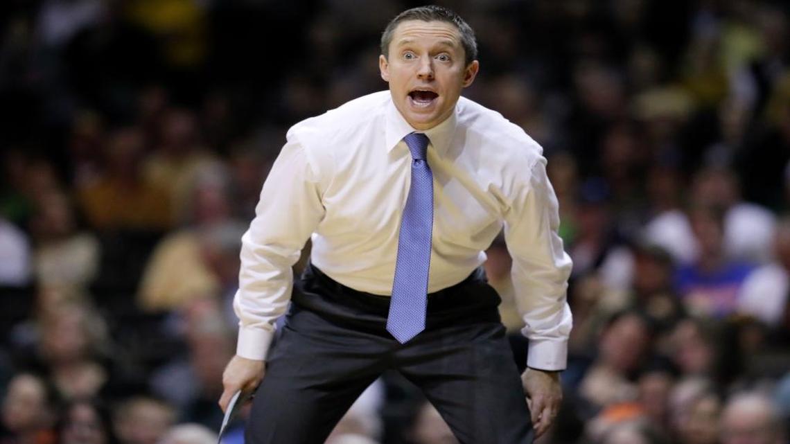In this Saturday, March 4, 2017, file photo, Florida head coach Mike White yells to his players in the second half of an NCAA college basketball game against Vanderbilt in Nashville, Tenn. After a two-year hiatus, the University of Florida has found its way back into the NCAA Tournament.