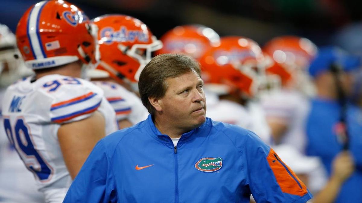 Florida head coach Jim McElwain walks before the first half of the Southeastern Conference championship NCAA college football game between Alabama and Florida, Saturday, Dec. 5, 2015, in Atlanta.