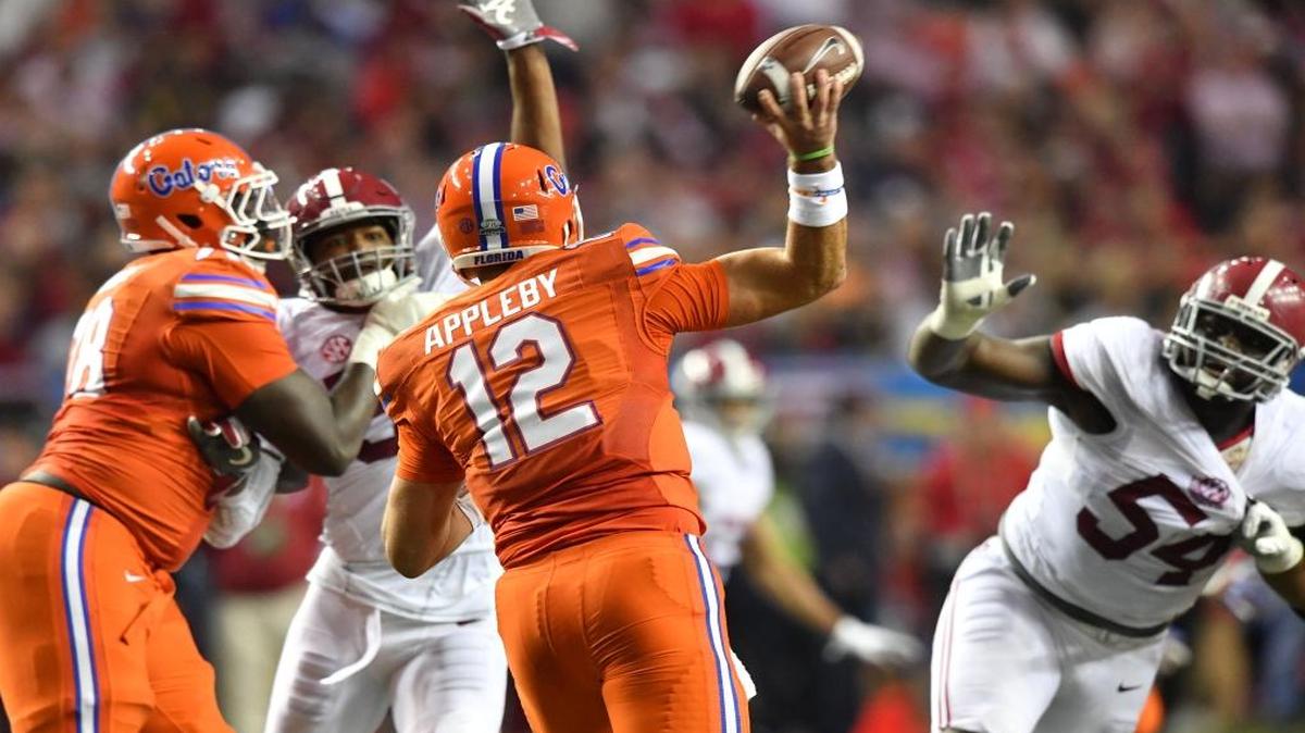 Florida quarterback Austin Appleby (12) gets off a pass in the first half against Alabama during the Southeastern Conference championship at the Georgia Dome in Atlanta on Sat., Dec. 3, 2016. Alabama won, 54-16.