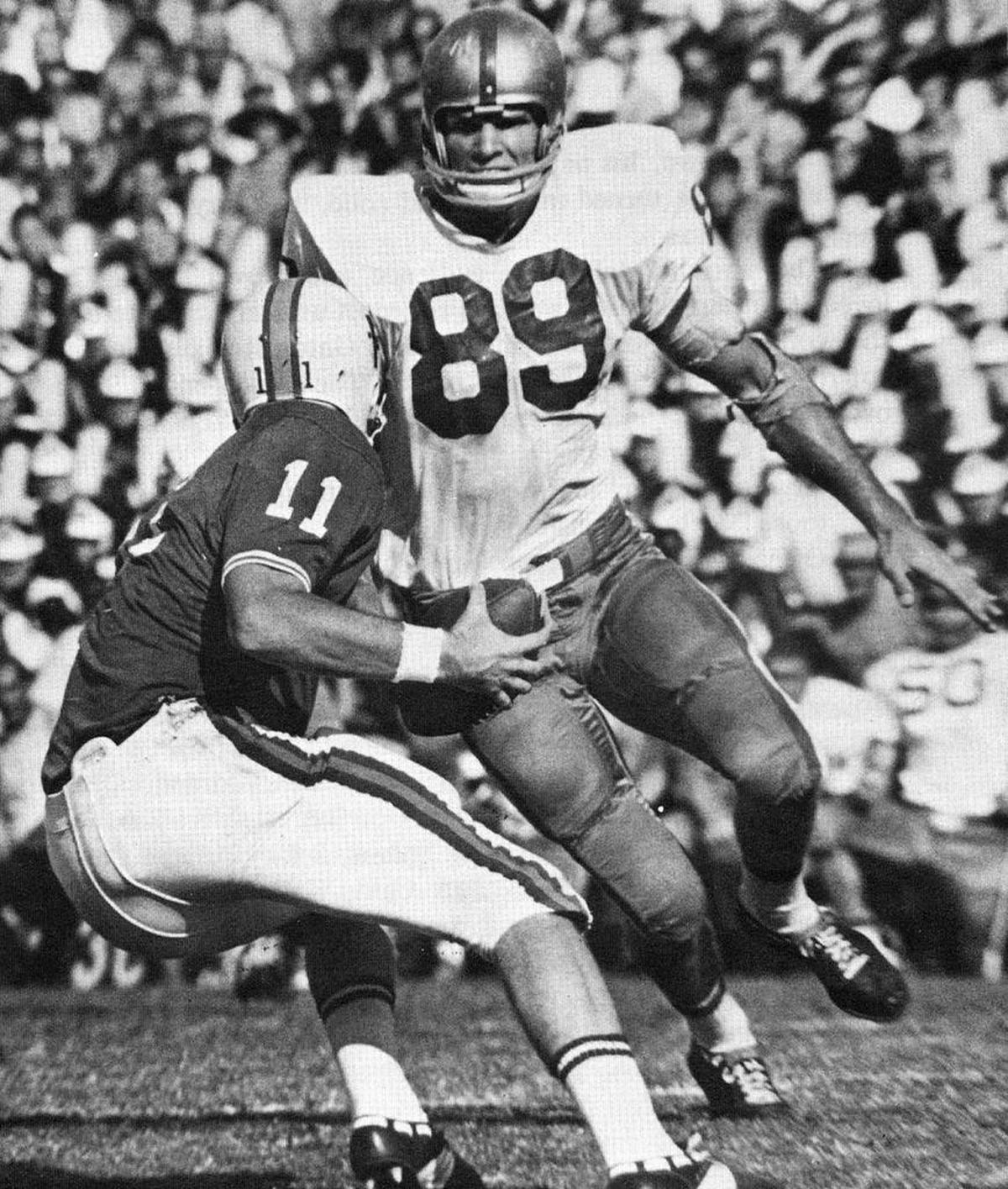 Miami defensive end Ted Hendricks, now in the Pro Football Hall of Fame (as an NFL linebacker), bears down on Florida quarterback Steve Spurrier in the Hurricanes’ 1966 upset of the Gators.