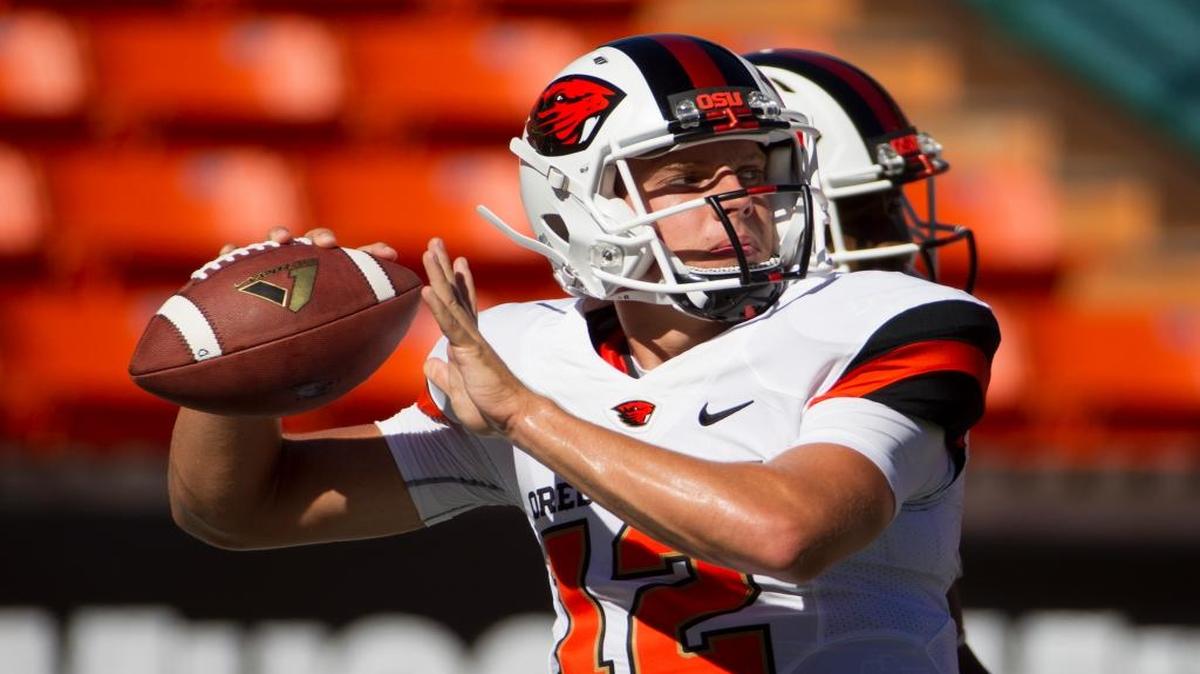 Former Oregon State quarterback Luke Del Rio (12) warms up before an NCAA college football game, Saturday, Sept. 6, 2014, in Honolulu.