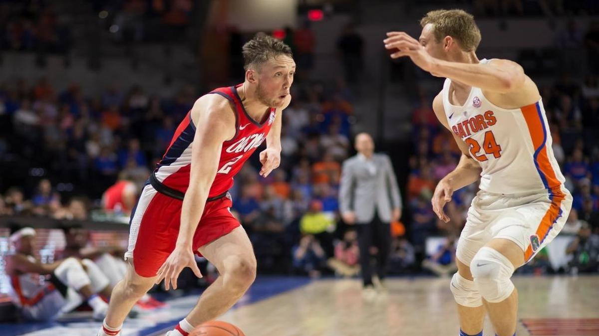Mississippi guard Cullen Neal (2) dribbles against the defense of Florida guard Canyon Barry (24) during the first half of an NCAA college basketball game in Gainesville, Fla., on Tuesday, Jan. 3, 2017.