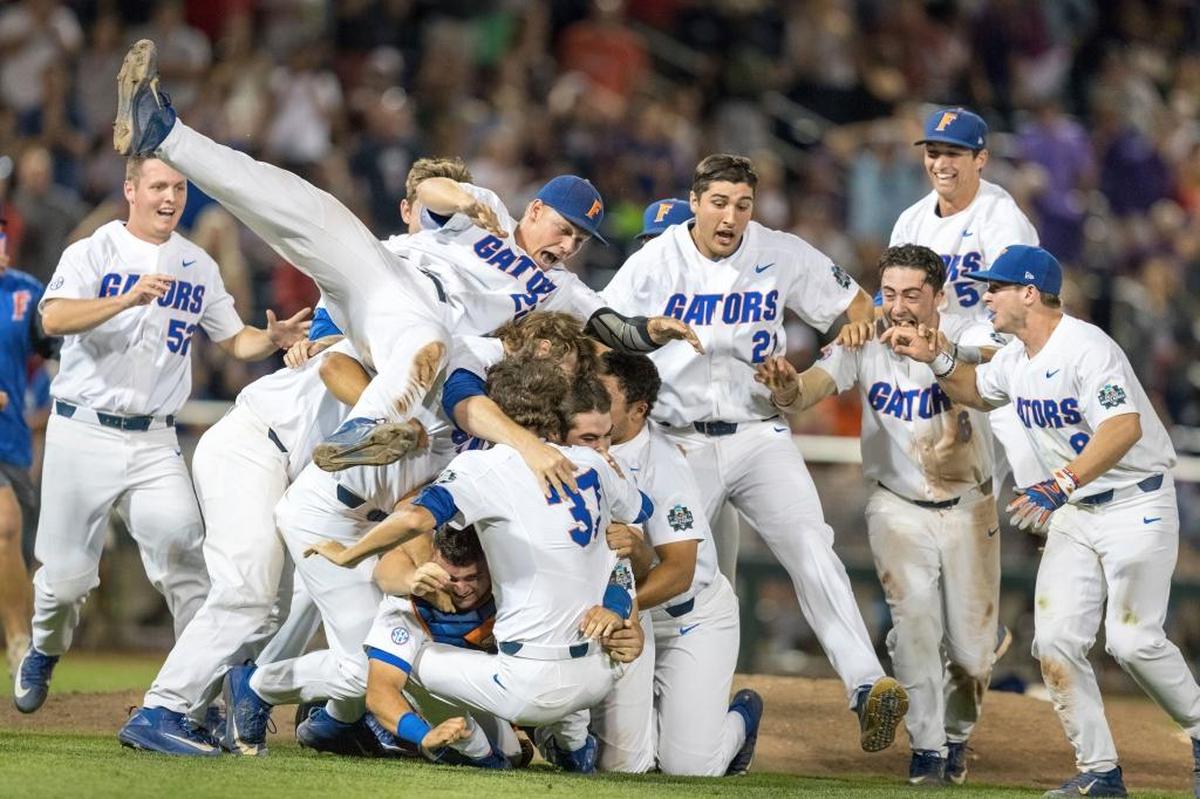 Florida celebrates after defeated LSU in Game 2 of the NCAA baseball College World Series finals, Tues., June 27, 2017, in Omaha, Neb. Florida won 6-1 to sweep the series.