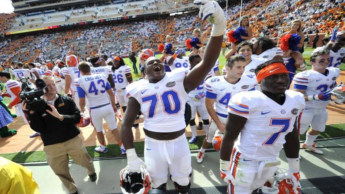 
Florida offensive lineman D.J. Humphries (70) celebrates their 10-9 win over Tennessee in an NCAA college football game at Neyland Stadium, Saturday, Oct. 4, 2014, in Knoxville, Tenn. 
